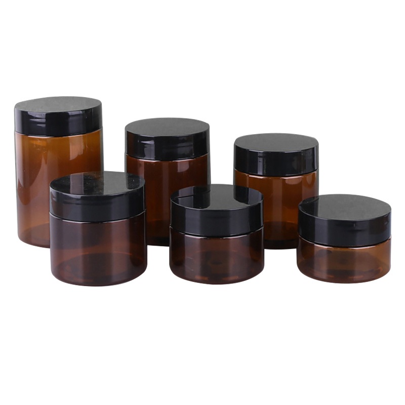 Wholesale cosmetic food packaging 100ml 150ml 200ml amber black pet plastic cosmetic cream jar with white black lid